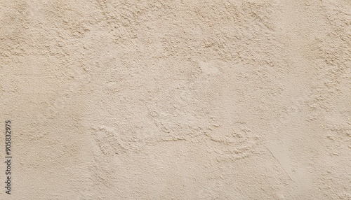 light beige rough grainy stone or plastered wall texture background