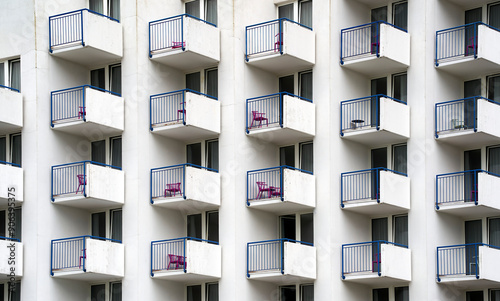 Monotonous boring empty balconies on a massive complex with small holiday apartments