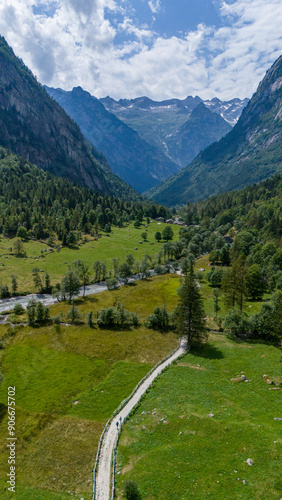 Aerial view of Val di Mello, a green valley surrounded by granite mountains and woods, renamed the Italian Yosemite Valley by nature lovers. Val Masino, Valtellina, Sondrio. Italy