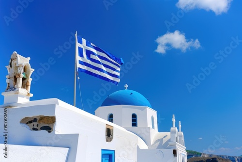 Greek flag waving over traditional white church with blue dome in greece