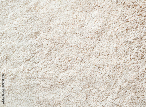 Closeup of soft beige shag rug texture for interior design