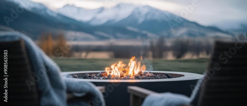 Cozy fire pit with mountain view and blankets