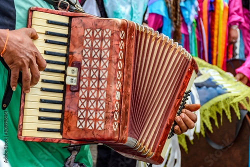 Accordionist playing during an important and traditional religious festival in the streets of Belo Horizonte, Brazil