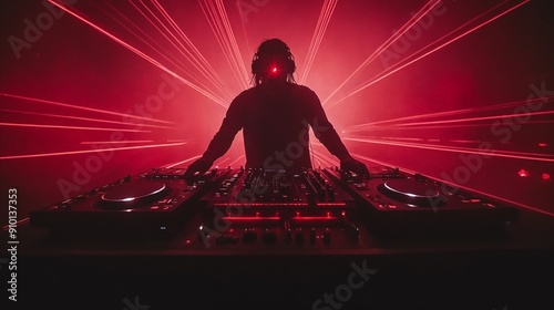 A man in a black shirt is playing a dj set.