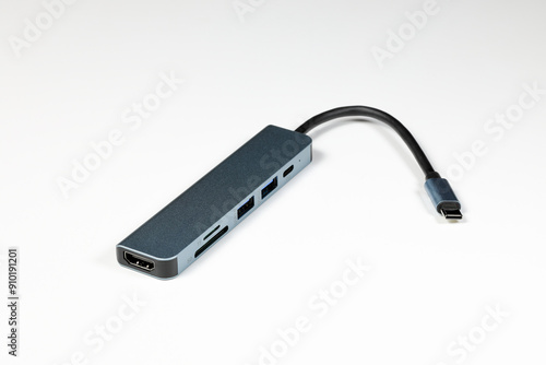 modern multifunctional adaptor or multiport docking station provide multi type of input output port for computer user - isolate on white background. 