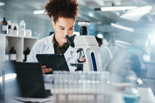 Woman, scientist and tablet with microscope in lab for experiment research, medical data or science information. Person, researcher and digital for biotechnology study, feedback and vaccine solution