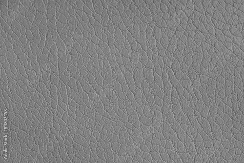 Texture of genuine leather or artificial synthetic leatherette gray color background