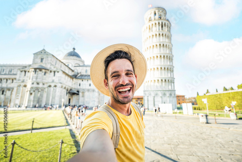 Happy tourist taking selfie picture in front of the famous leaning Tower and Pisa cathedral - Summertime holidays, tourism and technology concept