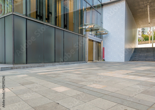 empty concrete ground in front of modern office buildings in downtown. floor for copy space.