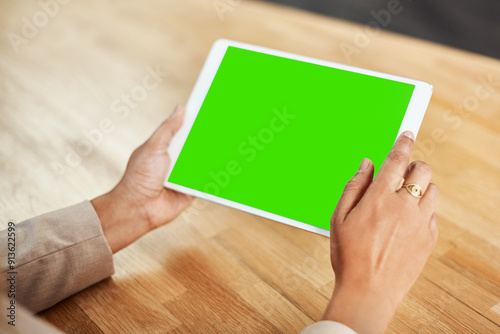 Green screen, hands and tablet with business person at desk of office for email, feedback or report. Advertising, marketing and technology with corporate employee in professional workplace closeup