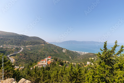 the ruines of Kaninë Castle which was built in the nearby village and the city of Vlore. It is located on the side of the Shushicë Mountain, about 380 metres above sea level and has views on the ocean