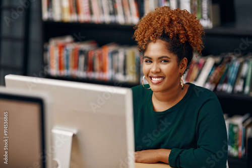 Black woman, computer and face in college library for literature course, research and scholarship opportunity. Student, study and portrait in university for education, learning or writing ebook story