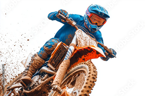 A motocross rider in full gear on a dirt track.