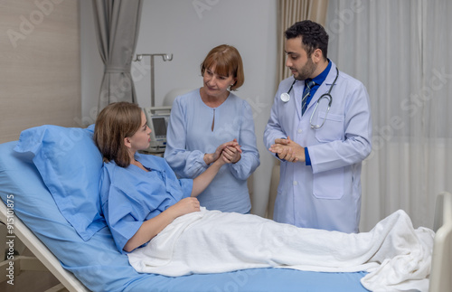 Doctor and Mother Supporting Hospitalized Patient