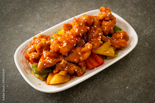 fried crispy chicken with sweet and sour sauce