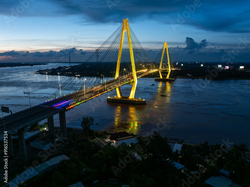 Aerial view of My Thuan 2 bridge during sunset with colorful light