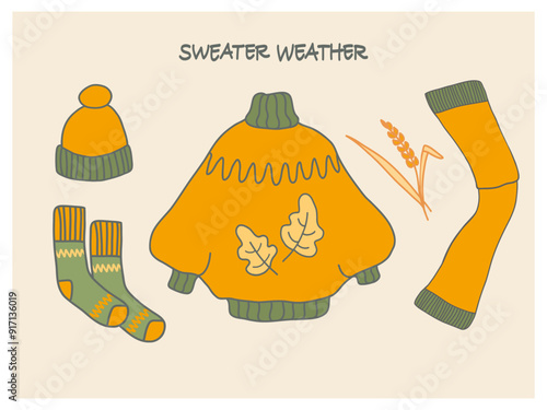 Cozy autumn illustration featuring a sweater, hat, socks, and arm warmers with autumn leaves