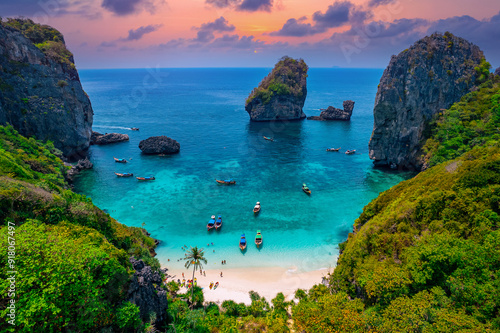 Turquoise lagoon with white coral sand Nui beach. Landscape koh Phi Phi Don island, Krabi, Thailand Aerial drone photo