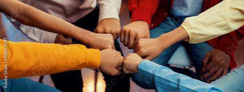 Startup company employee team stacking hand together symbolize successful group of business partnership and strong collective unity teamwork in community workplace in panoramic banner. Synergic