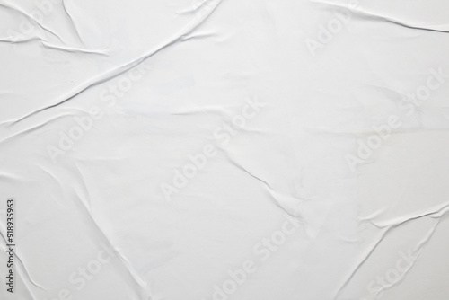 white crumpled and creased glued wrinkled paper poster texture background