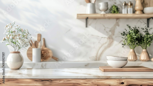 Stylish marble tabletop on wooden platform with copyspace for your logo at blurry kitchen utensils and dishes on light wall background