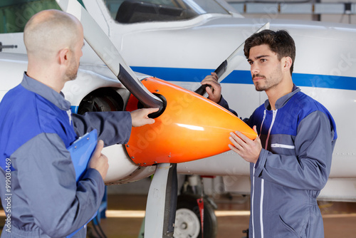 portrait of male aero engineer with clipboard