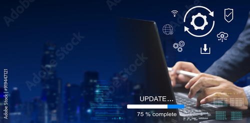 A business person updates software, installs an update process, and upgrades the software version concept. Software updates or operating system upgrades