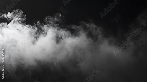 White smoke billows against a dark background.