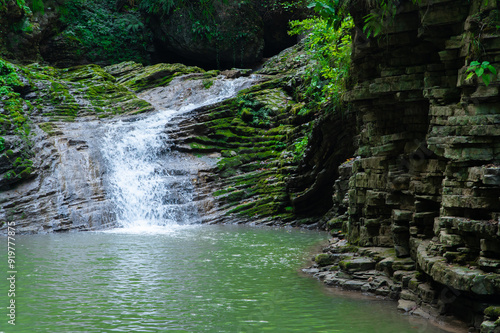 A small waterfall in a mountain canyon