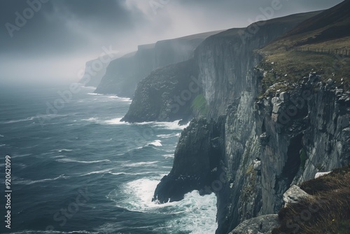 Stormy sea crashing against dramatic cliffs on a moody day, with dark storm clouds hovering above as waves pound the rugged coastline, showcasing raw nature's beauty in europe