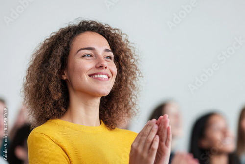 Happy people clapping and supporting each other in a group setting