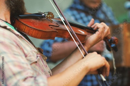 Violin and diatonic accordion player