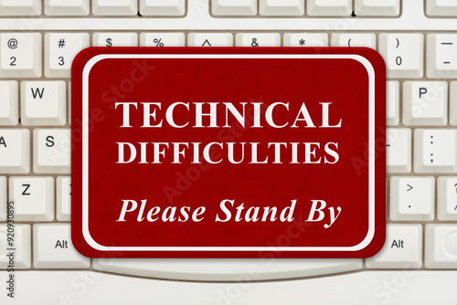  Technical Difficulties sign on keyboard