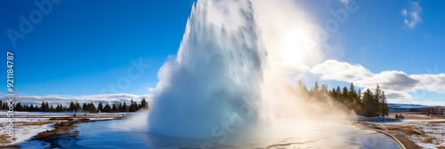 The Majestic Show of Power and Beauty: A Lone Geyser Erupting into the Clear Blue Sky