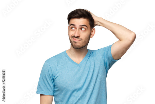 Young doubtful man thinking, scratching head and trying to find solution