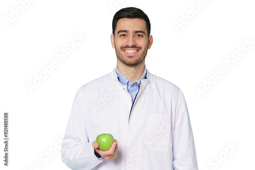 Smiling nutritionist or dentist doctor wearing white coat and round glasses, holding green apple in hand