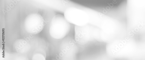 Blur white abstract background, blurred grey gradient bright light with copy space backdrop, banner, blank mordern business office interior hallway building design background, monochrome