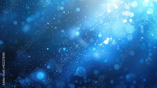 Abstract blue blurry unfocused sparkle glitter blue bokeh background wallpaper with copy space. Blue Christmas glitter design background.