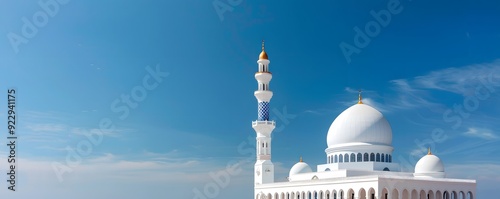 Minimalist mosque with a single dome and minaret