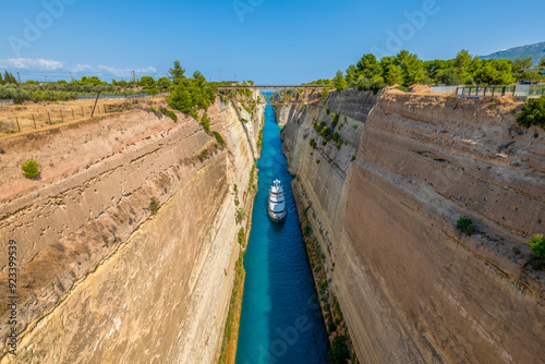 Greece Peloponnese Corinth Canal and a boat passing through the canal