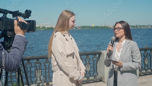 Outdoor News Interview Along City Waterfront