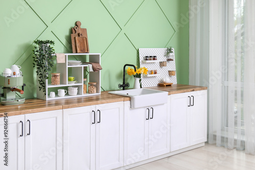 Stylish kitchen with white counters