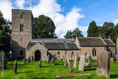 St Andrew's Church in Bolam, Northumberland. South elevation. Tower dates from the late Anglo-Saxon period