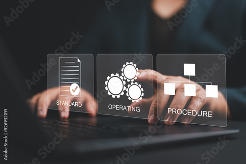 SOP, Standard operating procedure concept. Businessman use laptop with virtual SOP icons for the standard operating procedure with instruction, quality, process, operation, sequence, workflow.