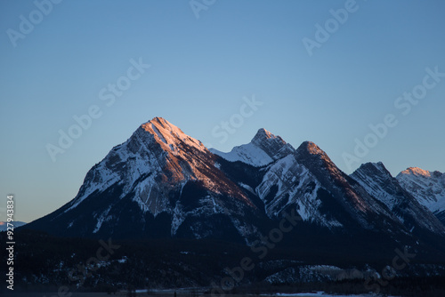 setting sun shone on the snowy mountain tops