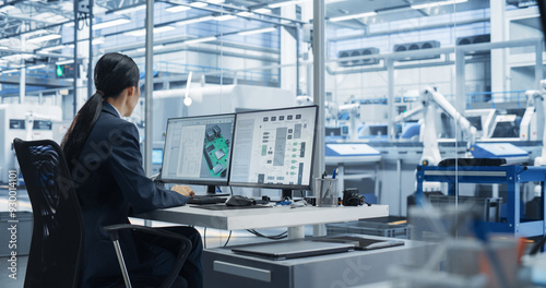 Asian Industrial Engineer Doing Creative Work on a Computer in Office. Female Creating an Innovative Motherboard with Powerful Microchips for Artificial Intelligence Systems