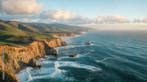 Coastal Cliffs and Ocean Waves in Golden Hour Light