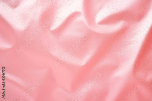 Close view of textured fabric with intricate patterns and vivid colors for textile use. Pink fabric