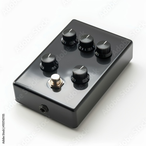 Black Guitar Pedal with Knobs and Jack: A close-up of a black guitar pedal with four knobs and a jack, isolated against a white background