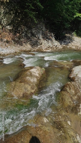 mountain river with stones and fast current